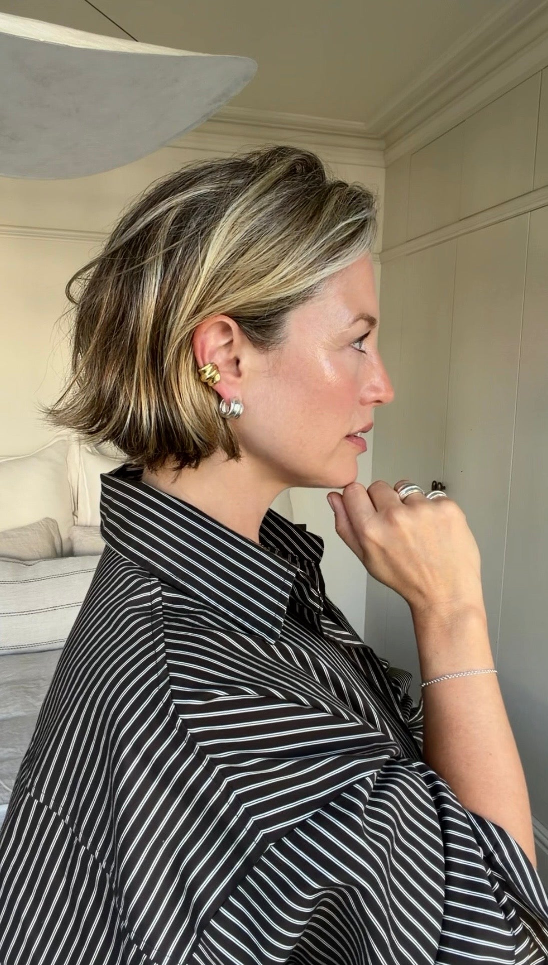 Alexis wears the Small Wave Hoops & Wave Ear Cuff